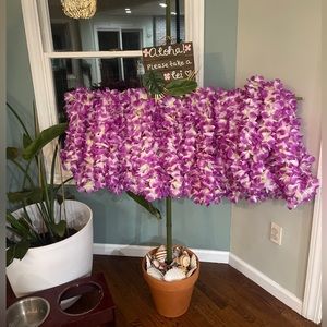 Aloha! Beautiful pack of thick & full purple orchid leis